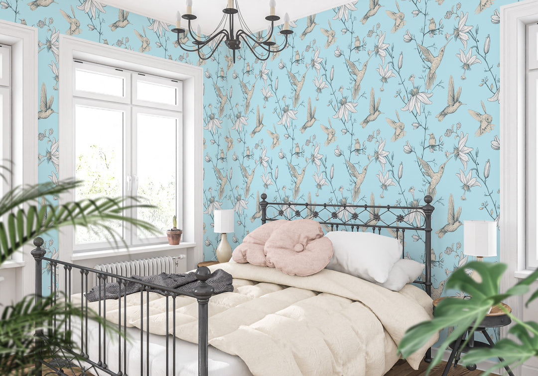 Bedroom with light blue botanical hummingbird and floral wallpaper featuring vintage-inspired bird pattern and neutral decor