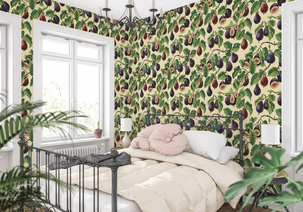Cream purple fig wallpaper with a bright green botanical pattern shown in a cozy bedroom.