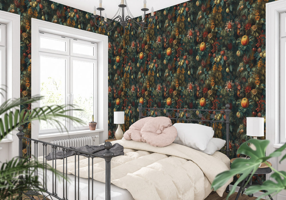 Dark teal dahlia wallpaper with vintage orange flowers, fruit and botanical foliage shown in a bedroom