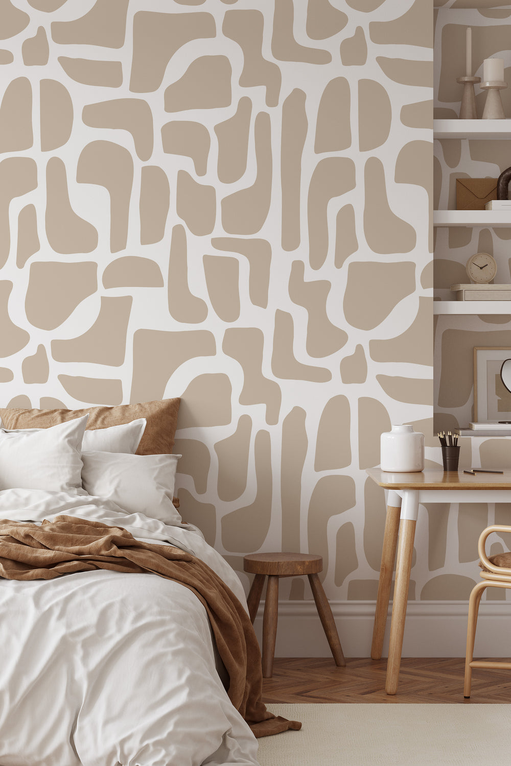 Beige and white abstract stone wallpaper in bedroom with side table and shelf