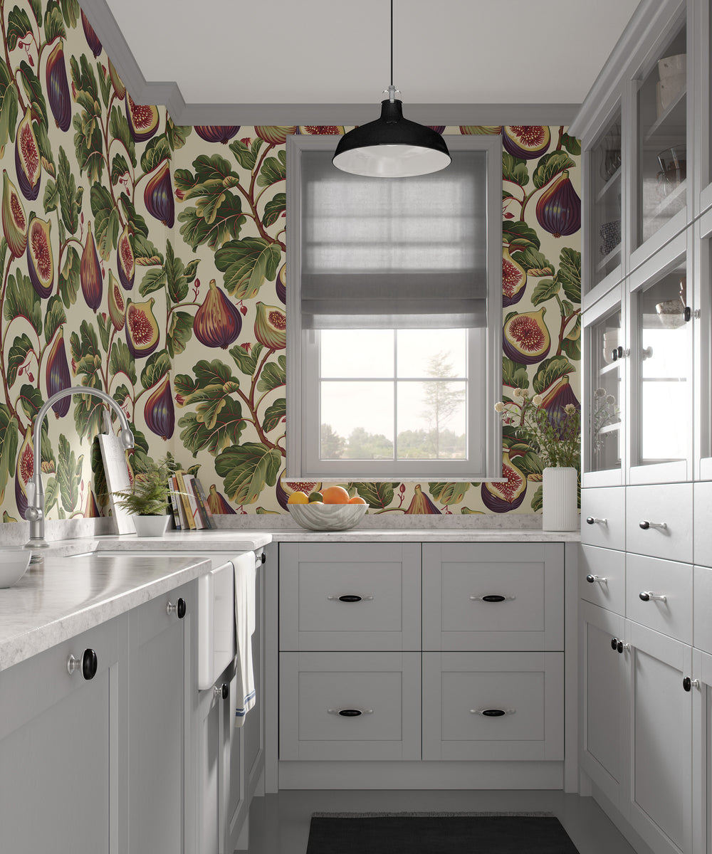 Cream fig wallpaper with a crimson-veined foliage pattern shown in a bright kitchen.