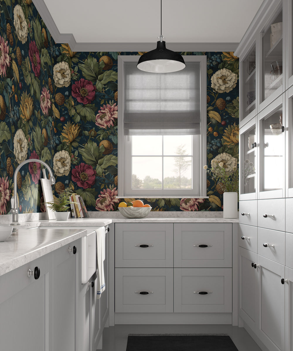 Dark teal vintage floral wallpaper with large pink and cream flowers, green leaves, and botanical foliage in a modern kitchen