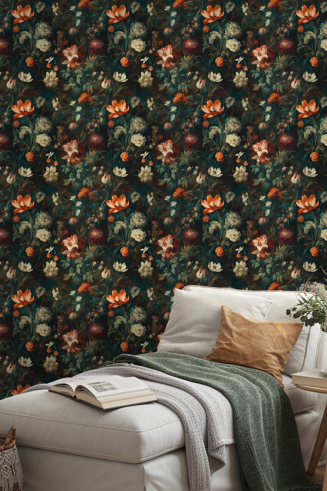 Orange and cream painterly botanical wallpaper featuring flowers, pomegranates, and lush green foliage in a cozy bedroom.