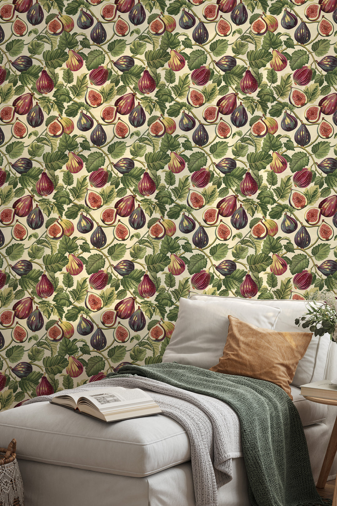 Cream wallpaper with a vintage purple fig and leafy botanical pattern, shown in a cozy living room