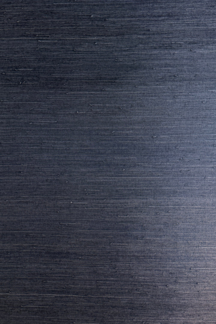 Natural super hemp wallpaper with deep woven texture, close-up view of dark blue hemp fiber surface showing horizontal weave and organic fiber variations