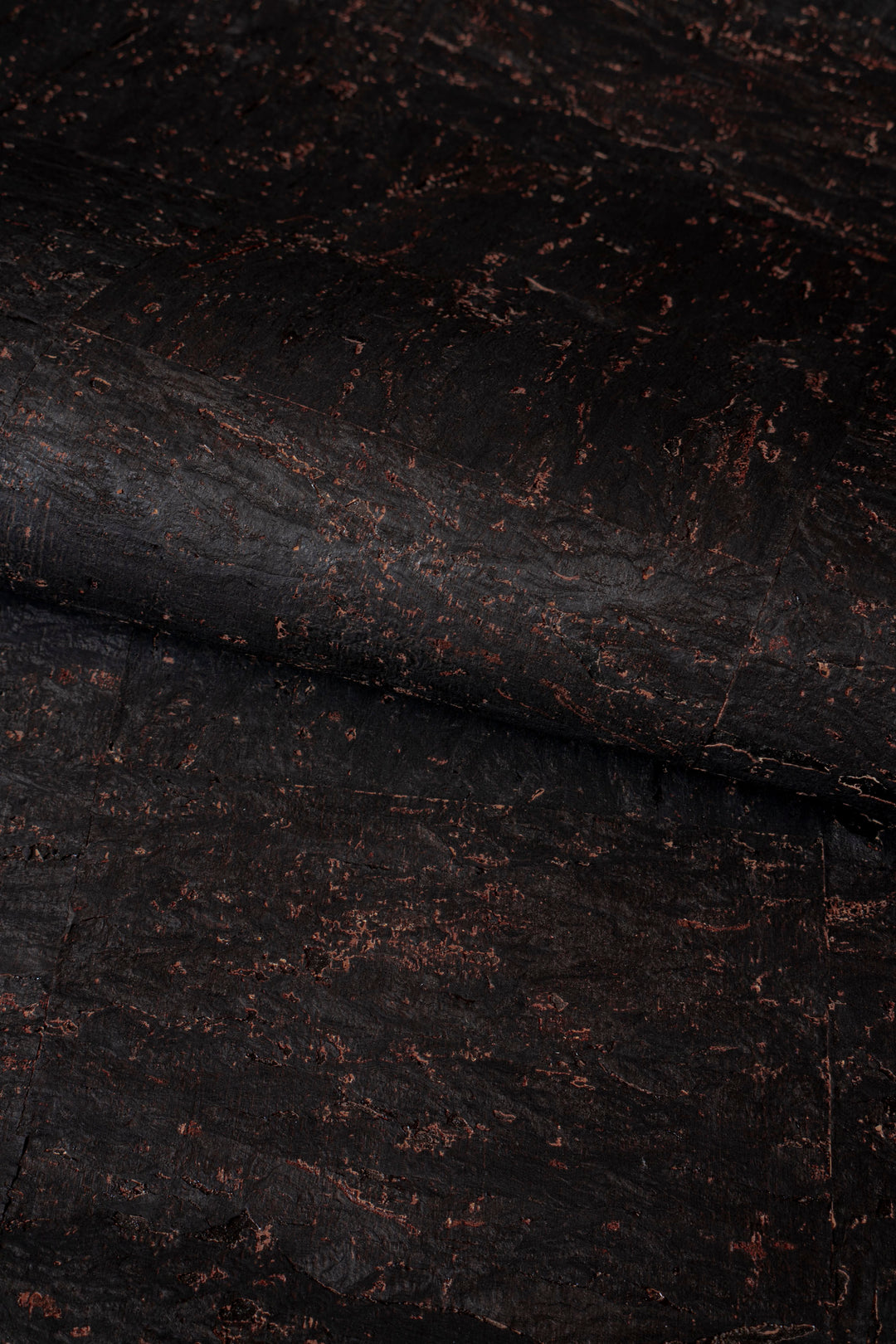 Close-up of dark brown leather texture