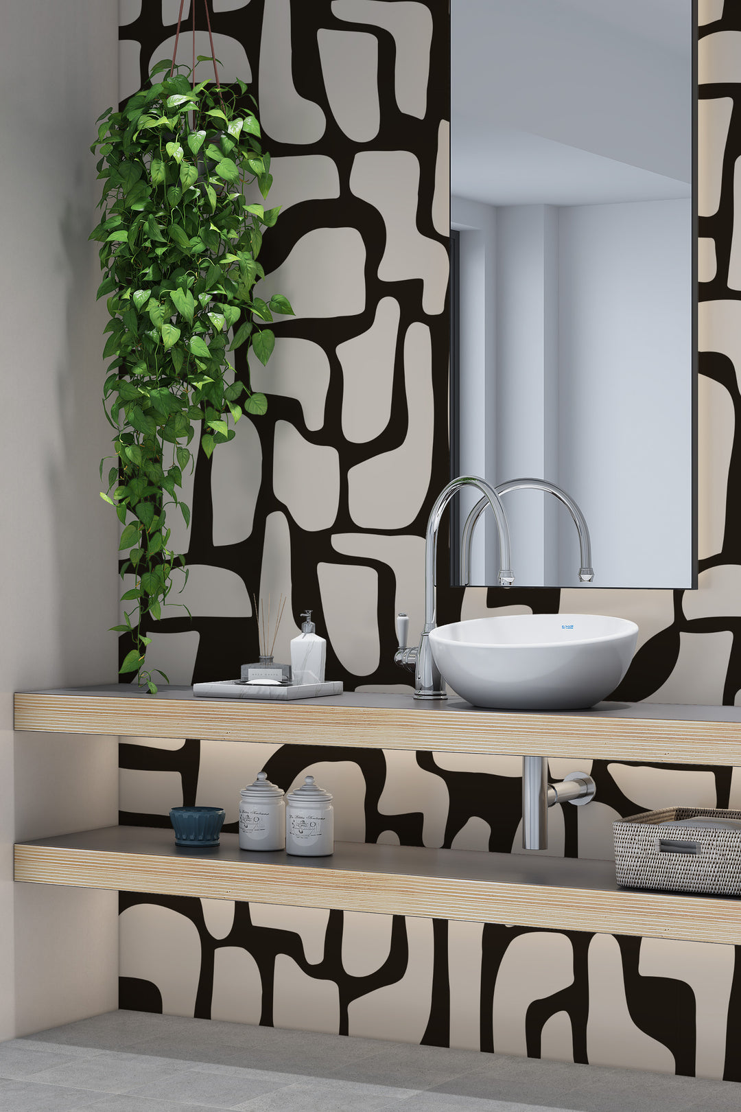 Black and beige abstract stone wallpaper with bathroom sink, mirror, and hanging plant