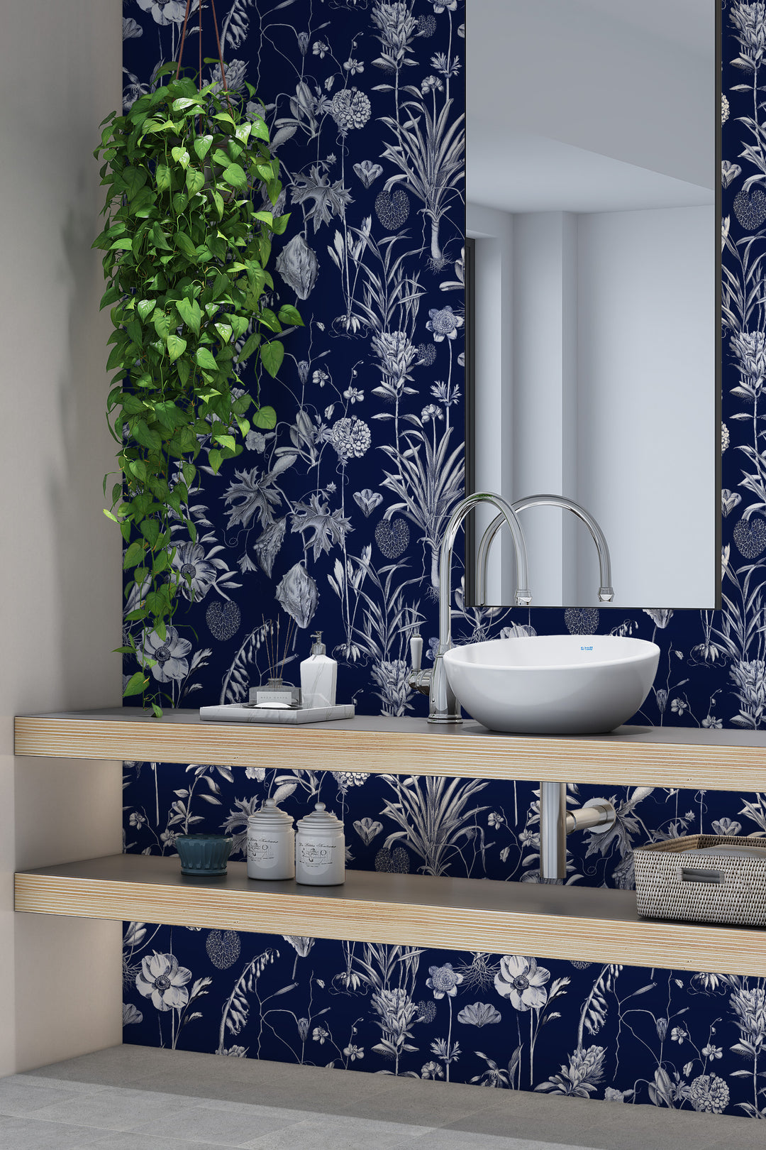 Midnight blue botanical toile wallpaper with bathroom sink, mirror, and hanging plant