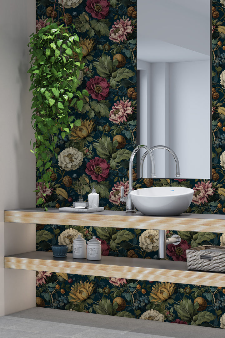 Dark teal vintage floral wallpaper with pink, cream, and yellow flowers, green leaves, and botanical foliage in a modern bathroom