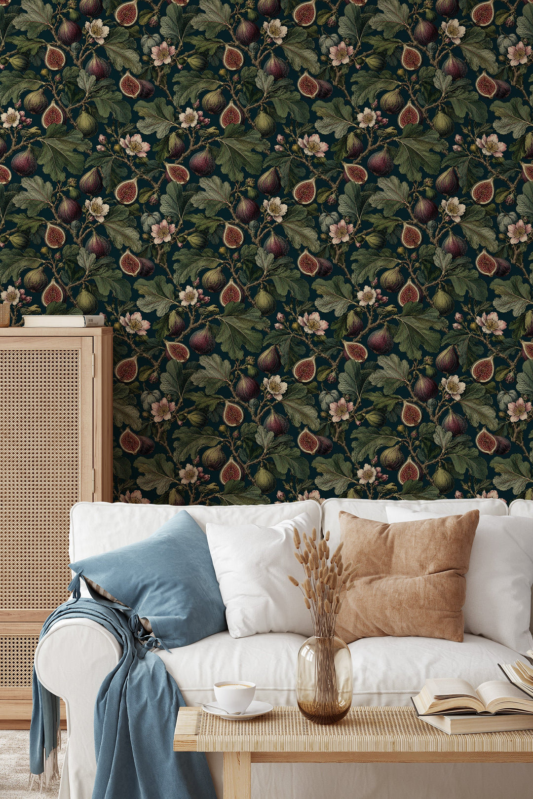 Dark teal fig leaf wallpaper with vintage botanical fruit and floral pattern in a living room
