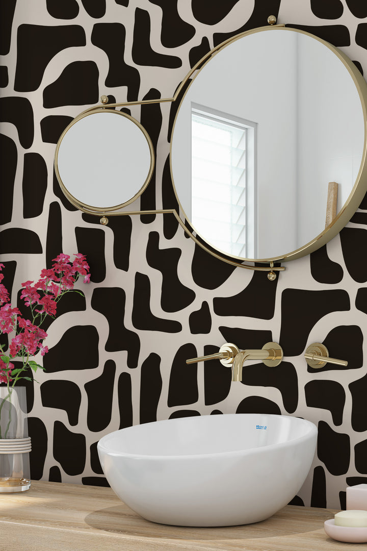 Black and beige abstract stone wallpaper with bathroom sink, mirror, and flowers