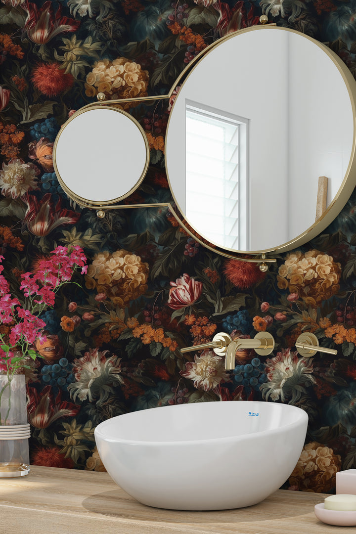 Dahlia Wallpaper Rust & Cream Vintage Floral Garden Pattern featured as a bathroom accent wall behind a white vessel sink and gold-framed mirrors.