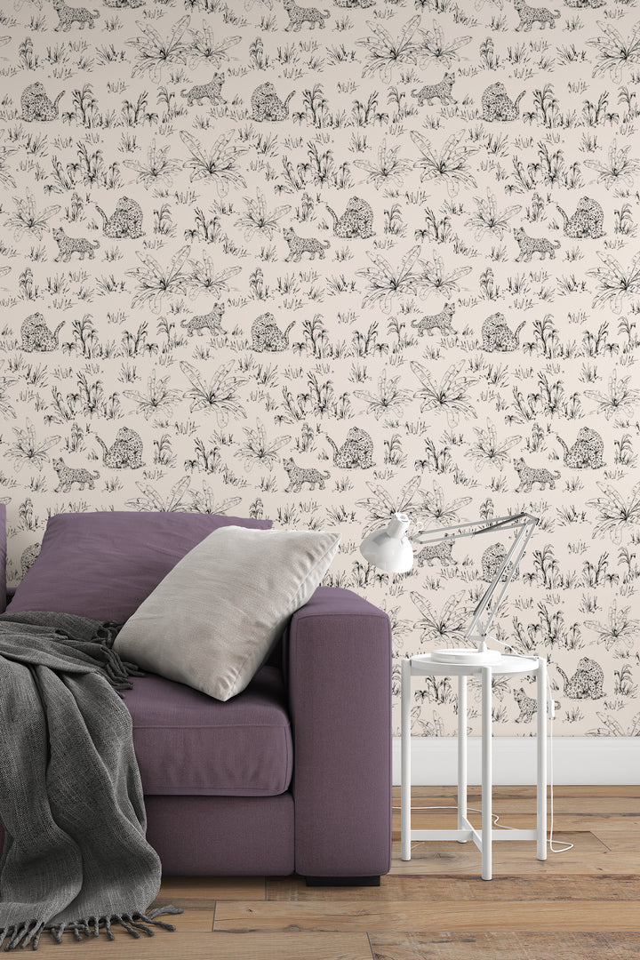Safari leopard wallpaper with black tropical leaf line art on beige background, sofa, side table, and lamp