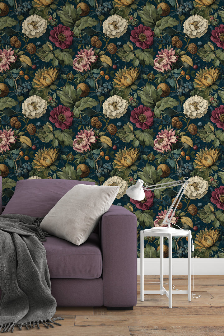 Dark teal vintage floral wallpaper with pink, cream, and yellow flowers, green leaves, and botanical foliage in a living room