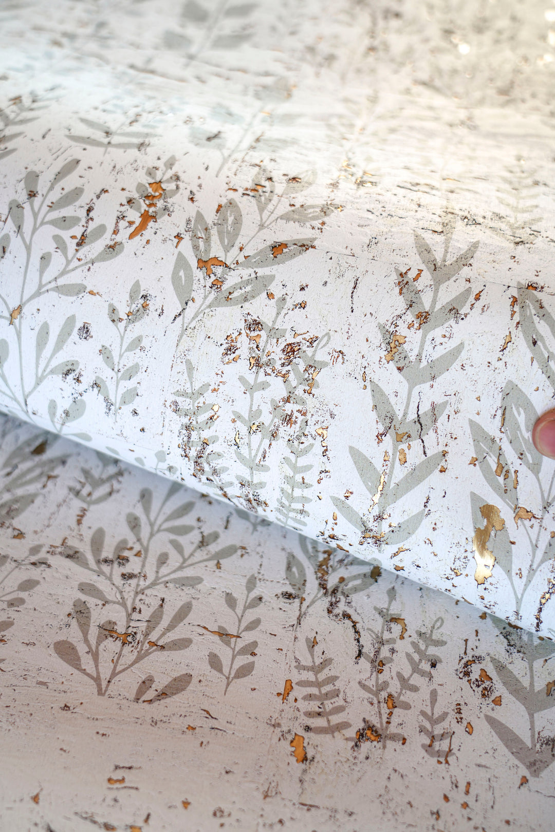 Boho Herbs Cork Wallpaper 73305 featuring delicate botanical foliage printed on natural white cork with metallic gold accents.