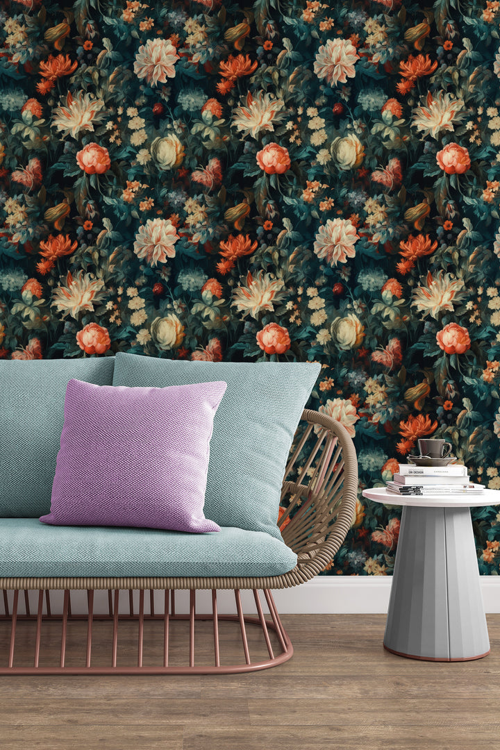Cream and orange floral wallpaper on a dark teal background featured as a living room accent wall behind a light blue sofa and white side table.