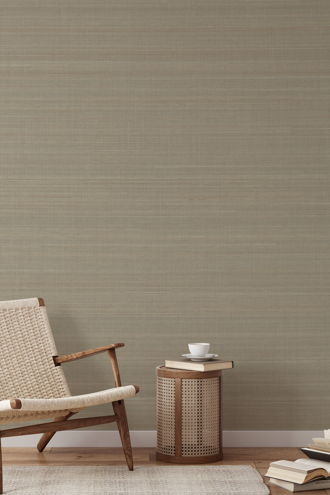 Woven armchair with a book on soft beige faux abaca grasscloth texture