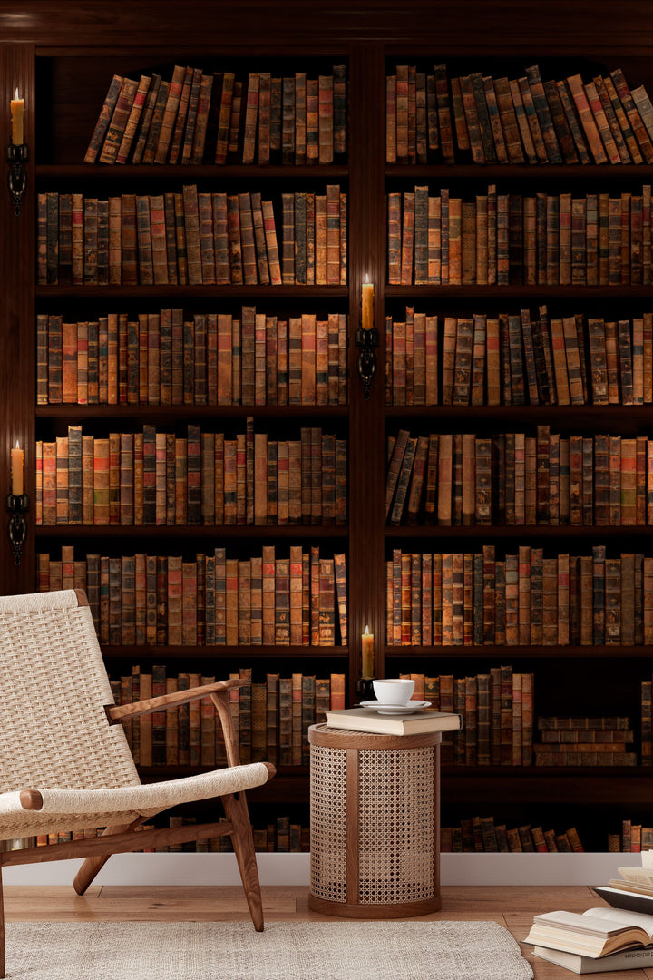 Wallpaper for walls Library bookshelf filled with old books in a dimly lit room.