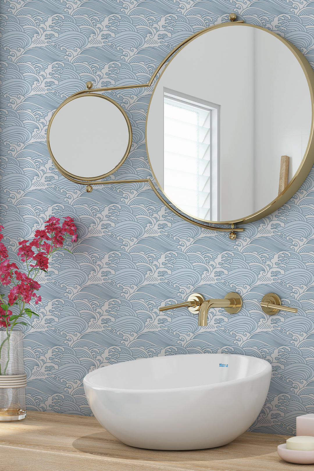 Bathroom with cool blue Japanese wave wallpaper featuring a calm ocean pattern and modern gold accents