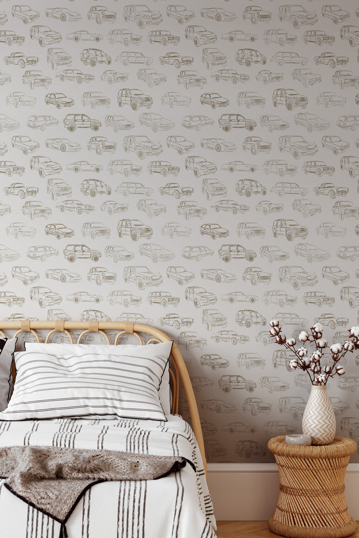 Neutral vintage car wallpaper with brown line art vehicle illustrations in a cozy modern bedroom with rattan furniture