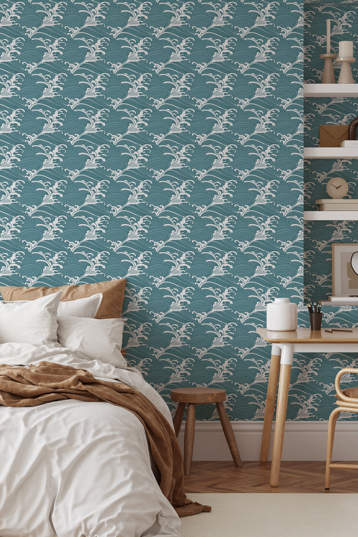 Bedroom with teal blue Japanese wave wallpaper featuring a bold traditional ocean pattern and warm neutral decor