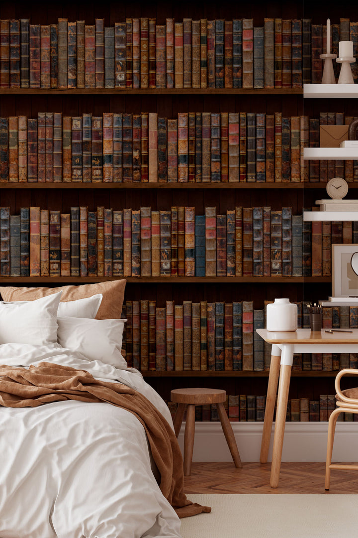wallpaper for wlls murals Shelves filled with vintage books with worn leather bindings