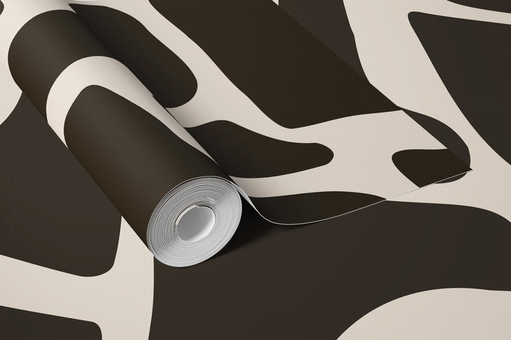 Roll of beige and black abstract stone wallpaper with bold curved pattern