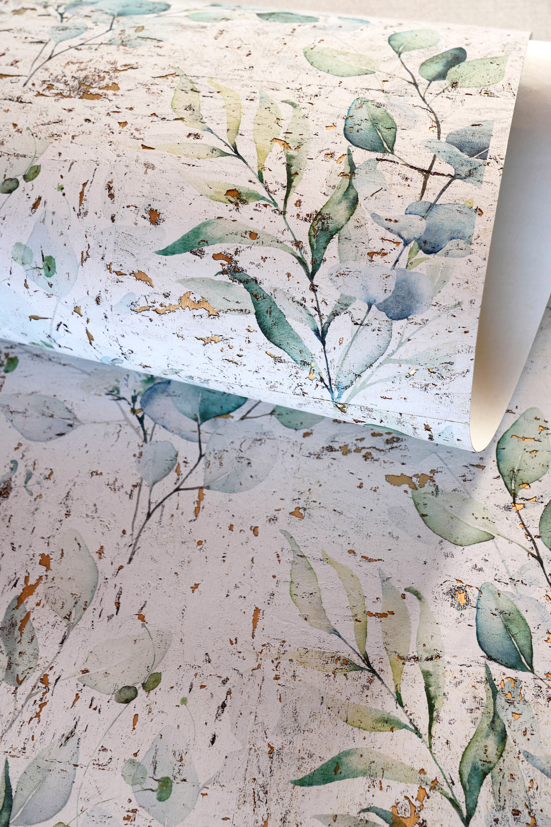 Eucalyptus Cork Wallpaper 73307 featuring watercolor eucalyptus leaves printed on natural white cork with metallic gold accents.