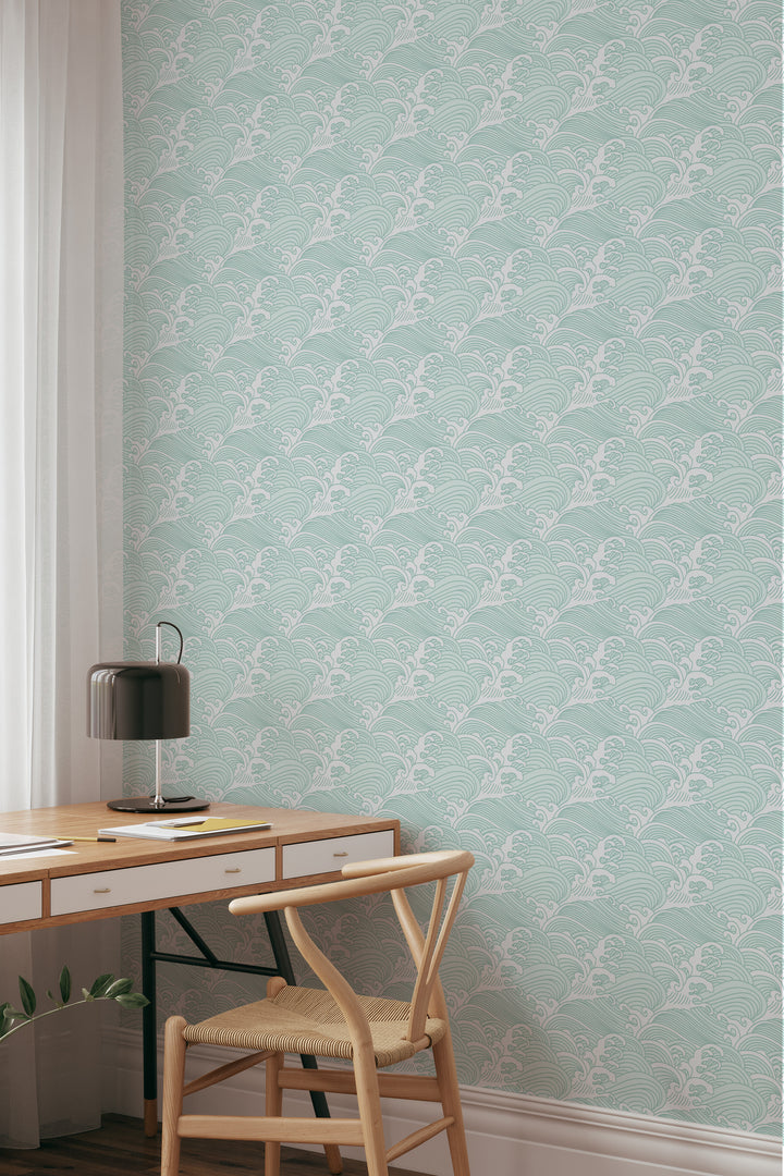 Home office with light aqua Japanese wave wallpaper featuring a traditional ocean pattern and natural wood decor
