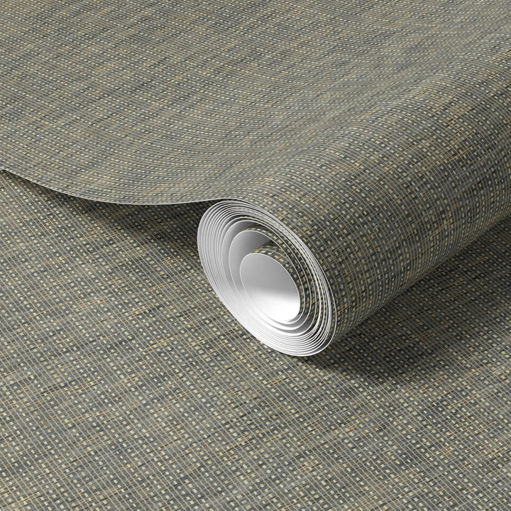 Roll of textured gray wallpaper on a matching background 70250