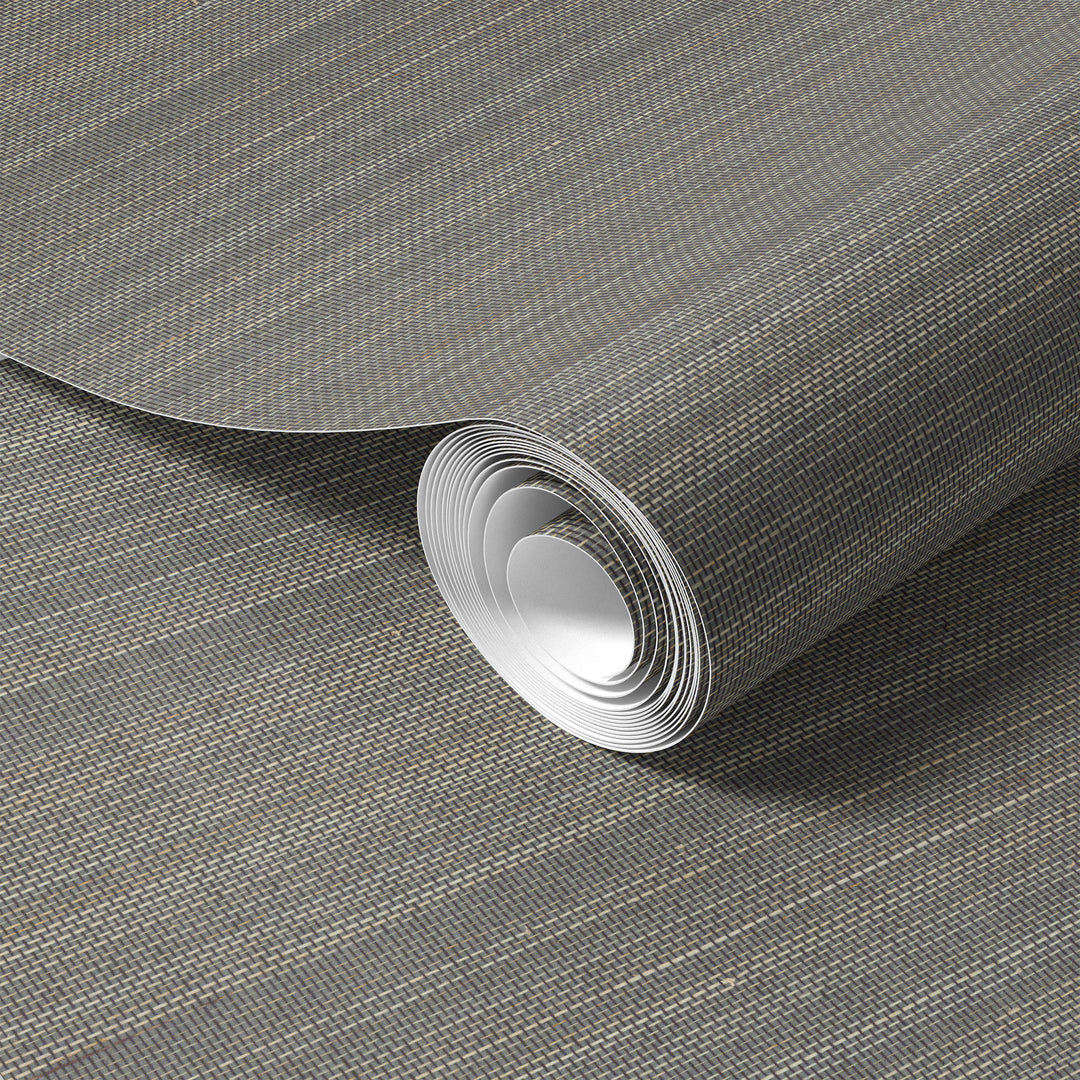 Roll of gray-beige faux abaca grasscloth wallpaper with subtle woven texture.