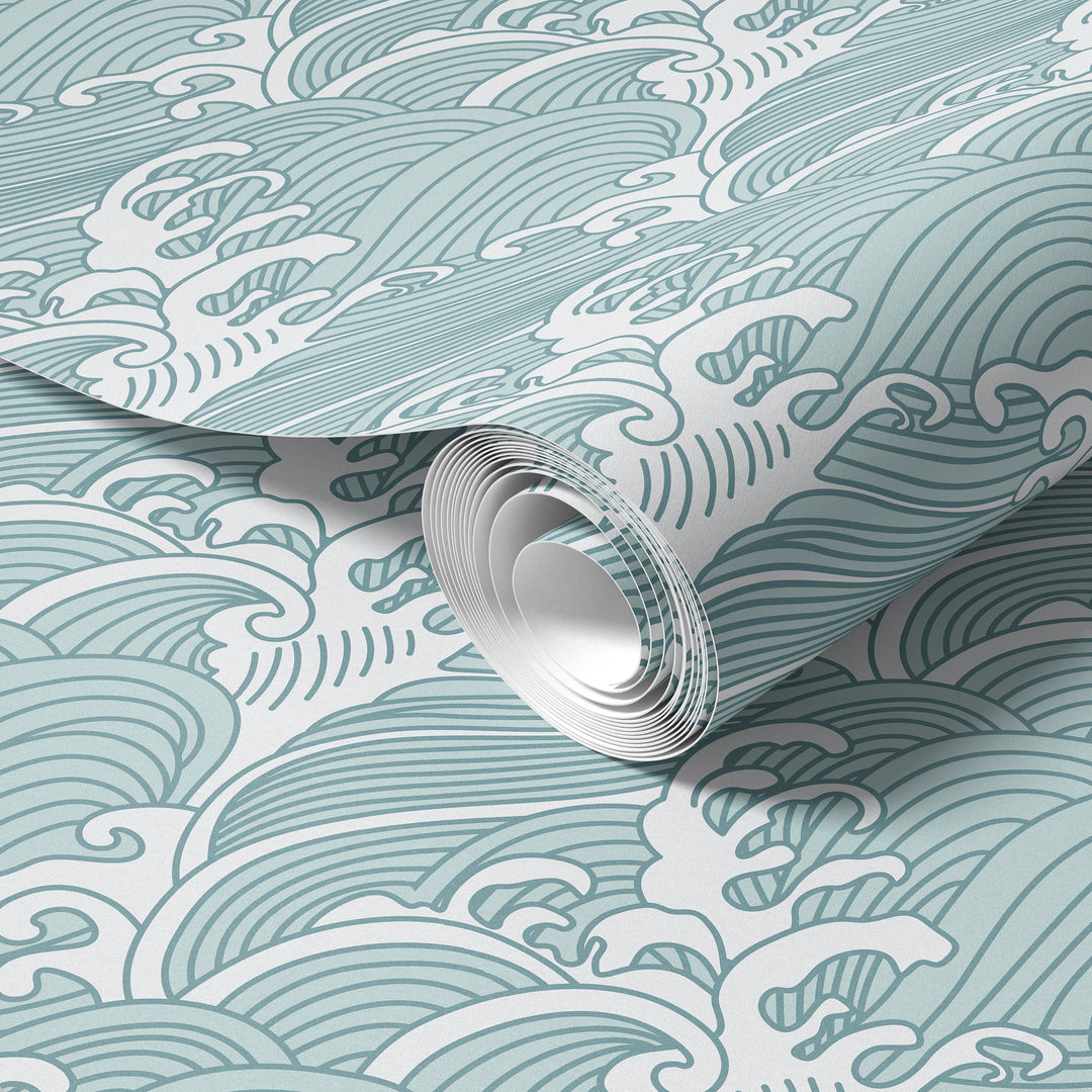 Roll of aqua blue Japanese wave wallpaper featuring a traditional ocean pattern