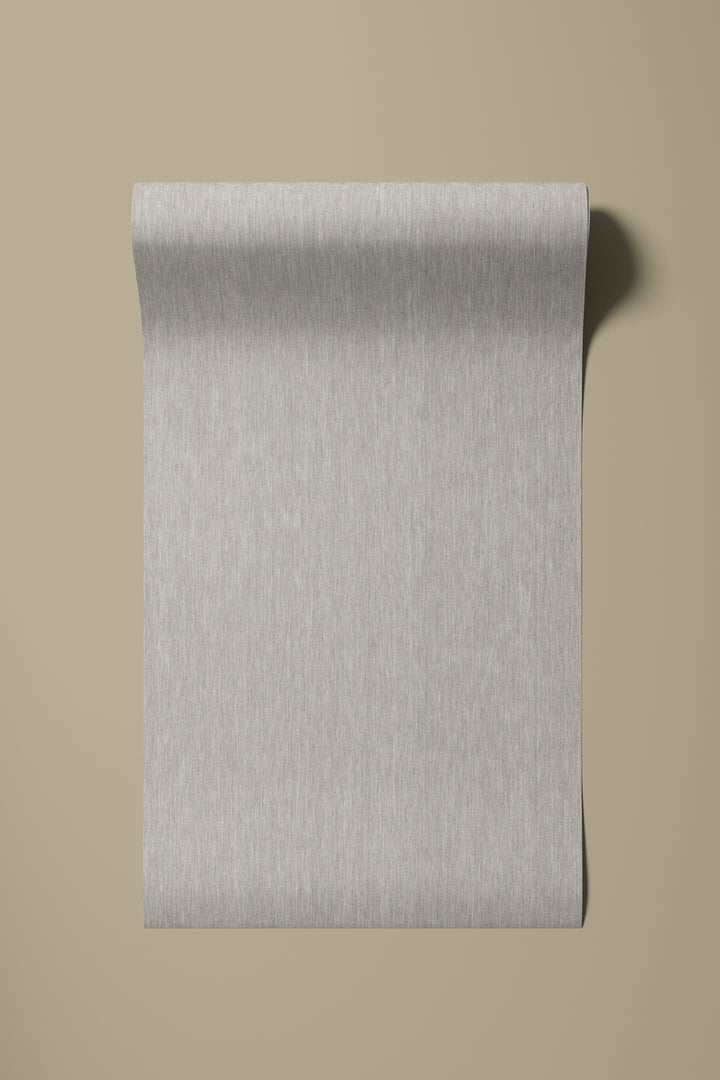 Light greige faux linen wallpaper sample roll featuring a subtle woven texture with fine, natural-looking fibers against a warm beige background.