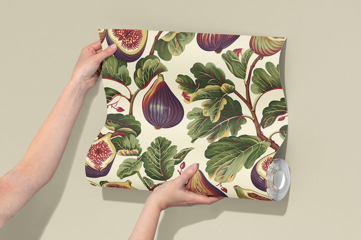 Cream fig wallpaper with a crimson-veined foliage pattern shown as a wallpaper roll sample.