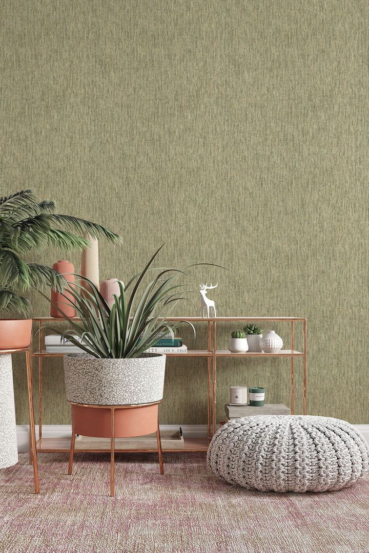 Plant-filled room with console table and pouf against faux paper weave wallpaper in natural beige and muted olive green woven texture