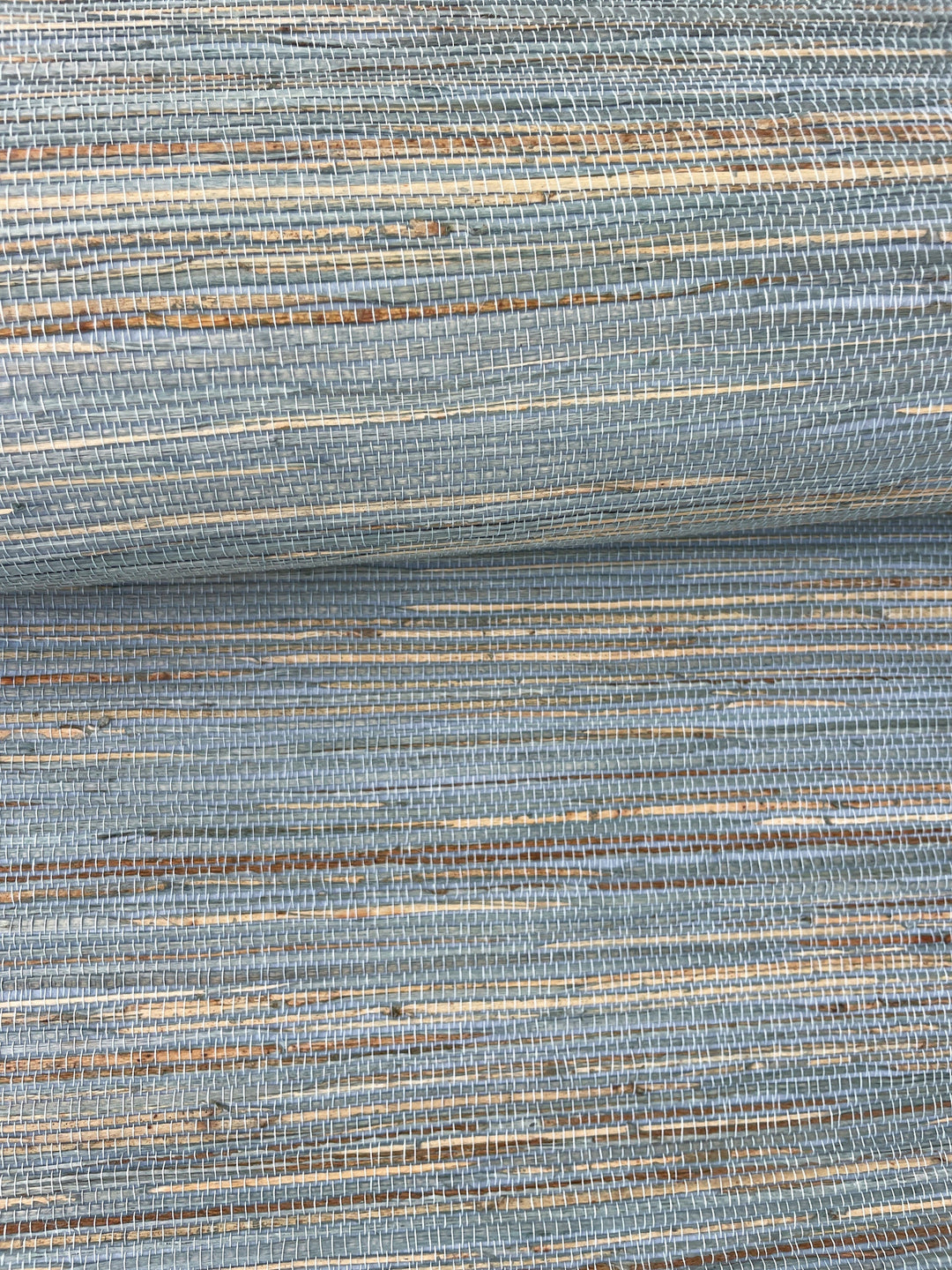 a close up shot of a blue and tan wallpaper