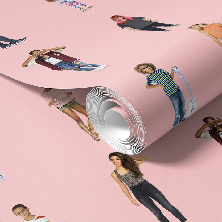 Roll of soft pink cutout people wallpaper with playful character pattern