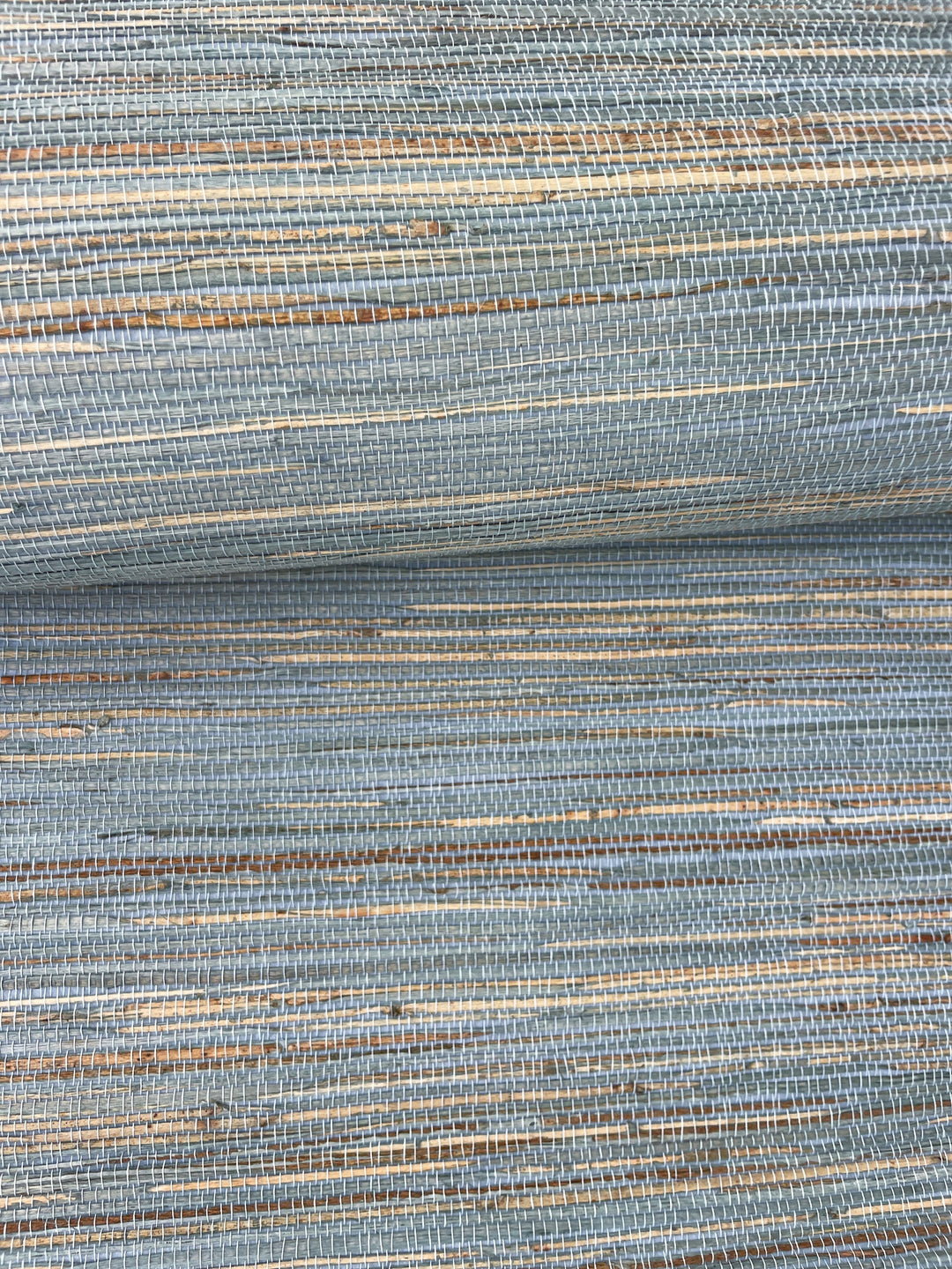 a close up shot of a blue and tan wallpaper